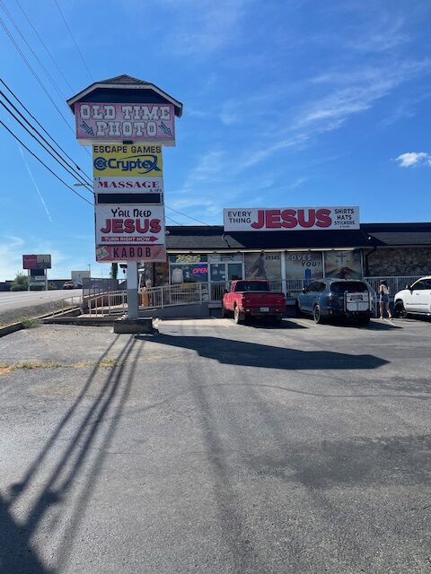 Everything Jesus sign and storefront