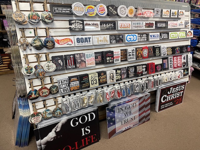 Everything Jesus yard signs, bumper stickers, and ornaments